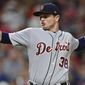 Detroit Tigers relief pitcher Justin Wilson delivers in the eighth inning of a baseball game against the Cleveland Indians, Sunday, July 9, 2017, in Cleveland. The Tigers won 5-3. (AP Photo/David Dermer)