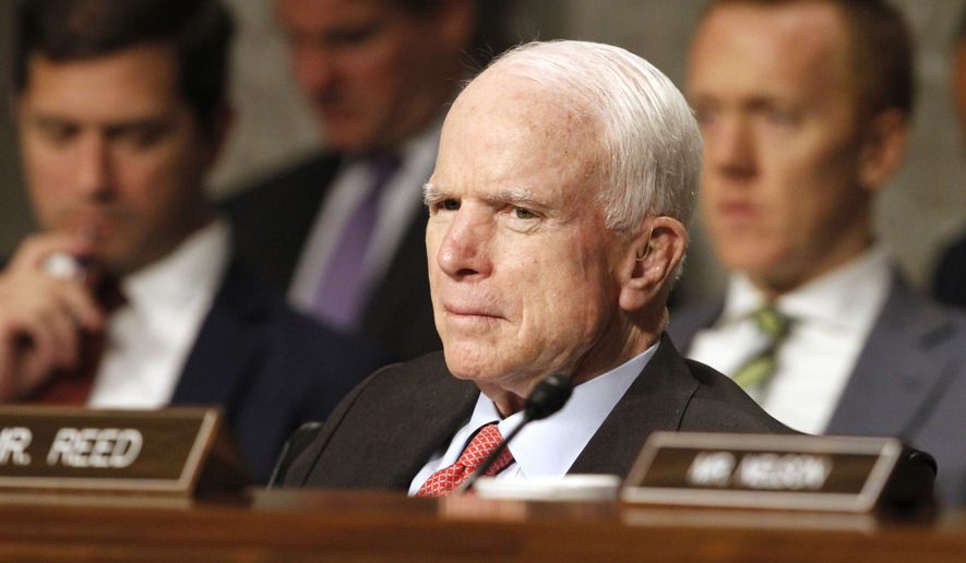 Senate Armed Services Committee Chairman Sen. John McCain, R-Ariz. listens on Capitol Hill in Washington, Tuesday, July 11, 2017, during the committee&#x27;s confirmation hearing for Nay Secretary nominee Richard Spencer.  (AP Photo/Jacquelyn Martin)