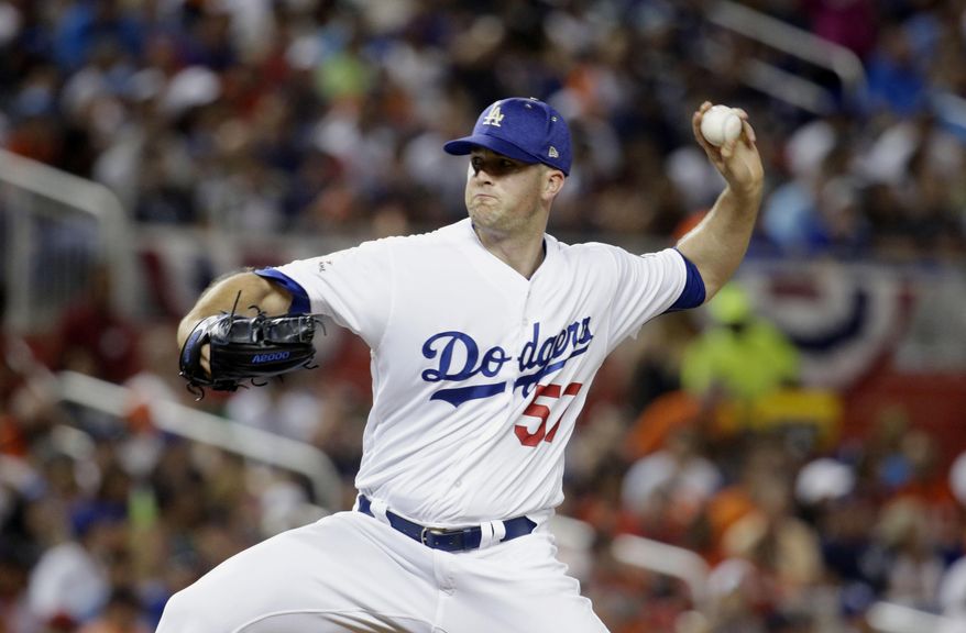 National League's Los Angeles Dodgers pitcher Alex Wood (57), delivers a pitch during the fifth inning, at the MLB baseball All-Star Game, Tuesday, July 11, 2017, in Miami. (AP Photo/Lynne Sladky)