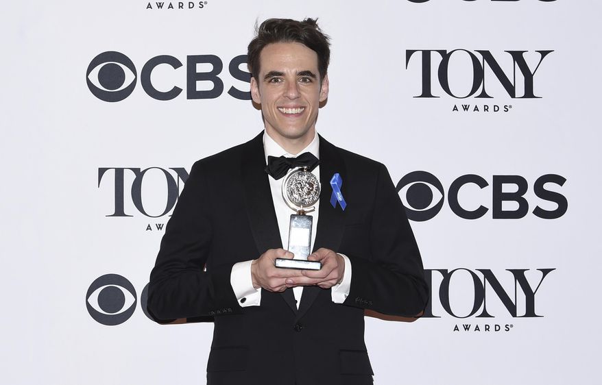 FILE - In this Sunday, June 11, 2017, file photo, Steven Levenson poses in the press room the award for best book of a musical for &amp;quot;Dear Evan Hansen&amp;quot; at the 71st annual Tony Awards in New York. Grand Central Publishing told The Associated Press on Tuesday, July 11, that “Dear Evan Hansen: Through the Window” will be released Nov. 21. Billed as a “behind the scenes” account, the book was written by the creative team of Levenson, Benj Pasek and Justin Paul. (Photo by Evan Agostini/Invision/AP, File)