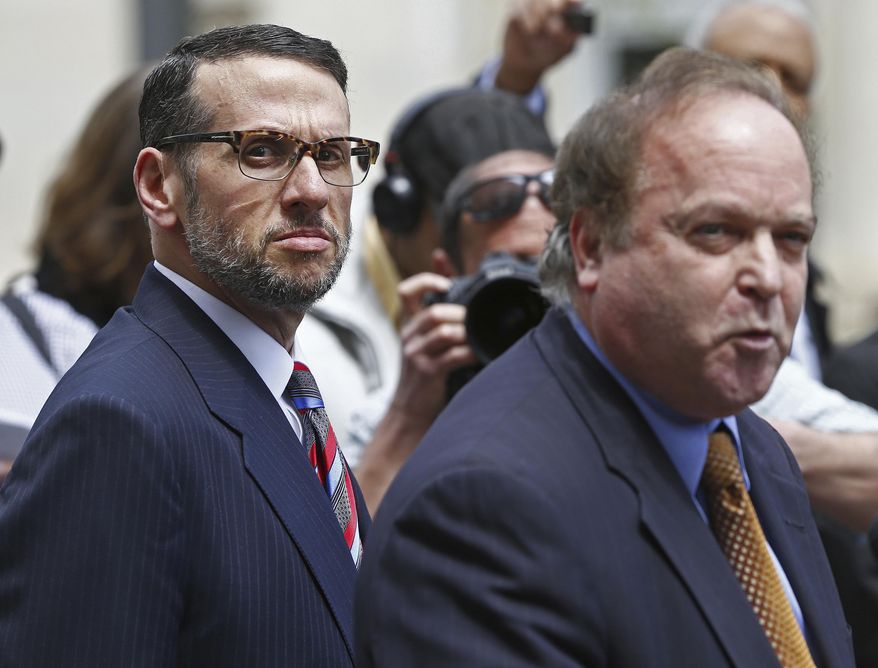 FILE – In this May 1, 2015, file photo, David Wildstein, left, listens as his attorney Alan Zegas, right, reads a statement to reporters at the Martin Luther King Jr. Federal Building and U.S. Courthouse in Newark, N.J. Wildstein faces 21 to 27 months in prison at his Wednesday, July 12, 2017, sentencing for orchestrating George Washington Bridge lane closures in 2013 to punish Fort Lee, N.J., Mayor Mark Sokolich, a Democrat who didn't endorse Republican Gov. Chris Christie's re-election. Federal prosecutors are asking a judge to allow Wildstein to avoid prison because his testimony helped convict two of Christie's former aides. Wildstein, appointed to The Port Authority of New York & New Jersey by Christie in 2010, pleaded guilty May 1, 2015. (AP Photo/Rich Schultz, File)