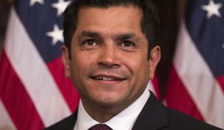 Representative-elect Jimmy Gomez, D-Calif., before a ceremonial swearing-in on Capitol Hill in Washington, Tuesday, July 11, 2017. (AP Photo/Carolyn Kaster)