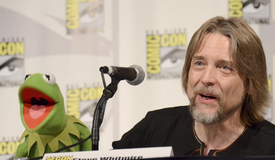 FILE - In this July 11, 2015, file photo, Kermit the Frog, left, and puppeteer Steve Whitmire attend "The Muppets" panel on day 3 of Comic-Con International in San Diego. ABC News and The Hollywood Reporter reported July 10, 2017, that Whitmire is no longer performing the character. (Photo by Tonya Wise/Invision/AP, File)