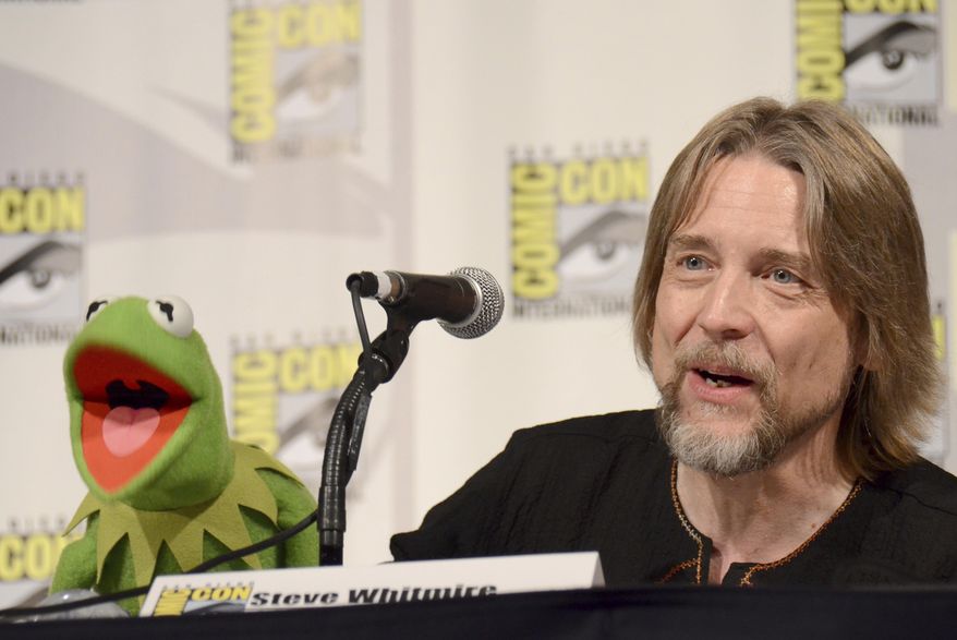 FILE - In this July 11, 2015, file photo, Kermit the Frog, left, and puppeteer Steve Whitmire attend "The Muppets" panel on day 3 of Comic-Con International in San Diego. ABC News and The Hollywood Reporter reported July 10, 2017, that Whitmire is no longer performing the character. (Photo by Tonya Wise/Invision/AP, File)