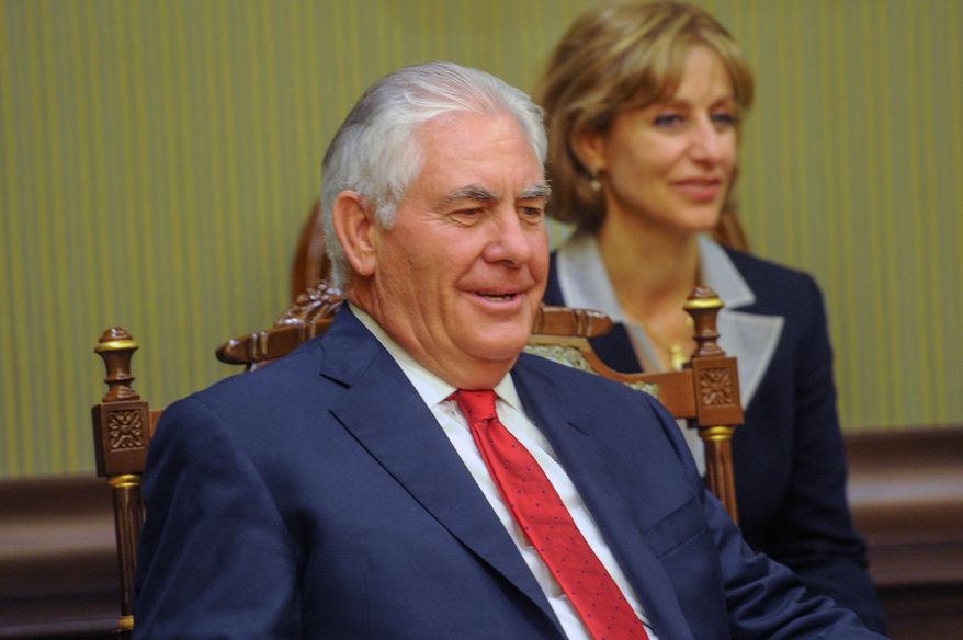 U.S. Secretary of State Rex Tillerson talks with Sheikh Sabah Khalid Al Hamad Al Sabah, First Deputy Prime Minister and Minister for Foreign Affairs of Kuwait, not pictured, after his arrival in Kuwait, Monday, July 10, 2017. (AP photo/Jaber Abdulkhaleg)