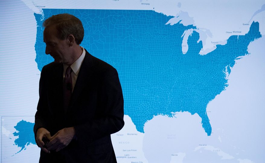 Microsoft President and Chief Legal Officer Brad Smith pauses in front of a monitor displaying the U.S. as he speaks in Washington, Tuesday, July 11, 2017, about Microsoft&#39;s project to bring broadband internet access to rural parts of the United States. (AP Photo/Carolyn Kaster)