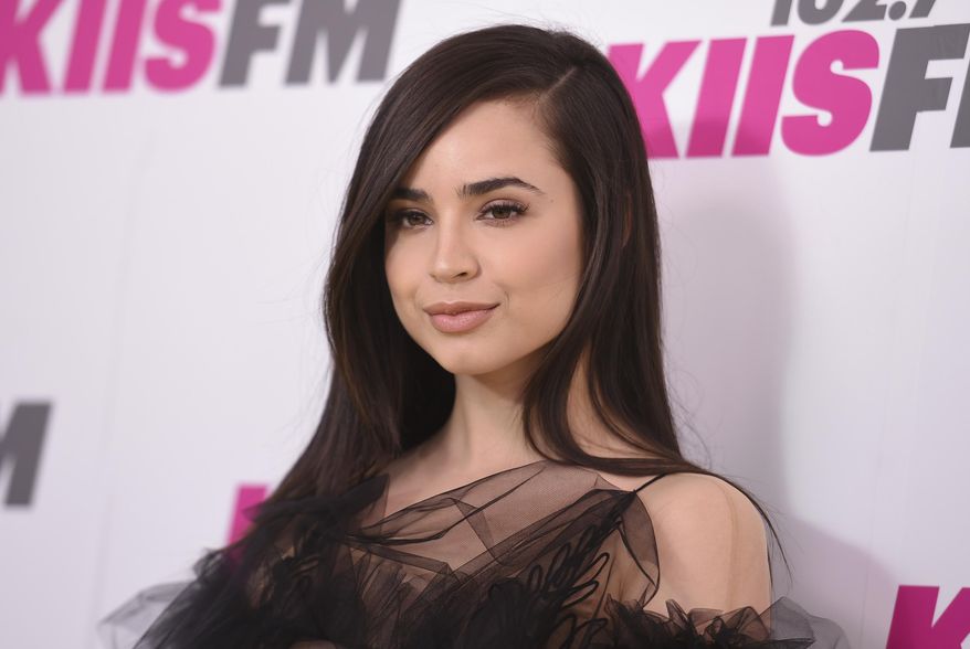FILE - In this May 13, 2017 file photo, actress Sofia Carson from "Descendants" arrives at Wango Tango in Carson, Calif. Carson and tennis star Novak Djokovic will be among the headliners at this year's Arthur Ashe Kids' Day, a stadium show on Saturday, Aug. 26, that kicks off the 2017 U.S. Open. (Photo by Richard Shotwell/Invision/AP, File)