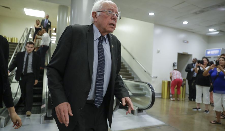 Sen. Bernie Sanders, I-Vt. leaves the Senate after a vote, on Capitol Hill in Washington, Wednesday, July 12, 2017. (AP Photo/J. Scott Applewhite)