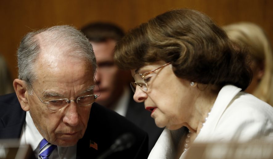 Senate Judiciary Committee Chairman Sen. Chuck Grassley, R-Iowa, talks with the Committee&#x27;s ranking member Sen. Dianne Feinstein, D-Calif., on Capitol Hill in Washington, Wednesday, July 12, 2017, during the committee&#x27;s confirmation hearing for FBI Director nominee Christopher Wray. (AP Photo/Pablo Martinez Monsivais) ** FILE **