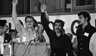 In this Sept. 4, 1972 file photo, Jose A. Gutierrez, left, of Texas, and Rodolfo &amp;quot;Corky&amp;quot; Gonzalez of Colorado, stand before the La Raza Unida Party national convention in El Paso, Texas. The term la raza has deep roots in Mexico after that country’s revolution and in the U.S. Chicano Movement of the 1970s which helped elect some of the nation&#39;s first Latinos to public office. But in the ever-evolving discussions of race and ethnicity in the U.S., some Latino advocates see the term as outdated and no longer useful in an era of a more racially diverse society and President Donald Trump. (AP Photo/Ferd Kaufman, File)