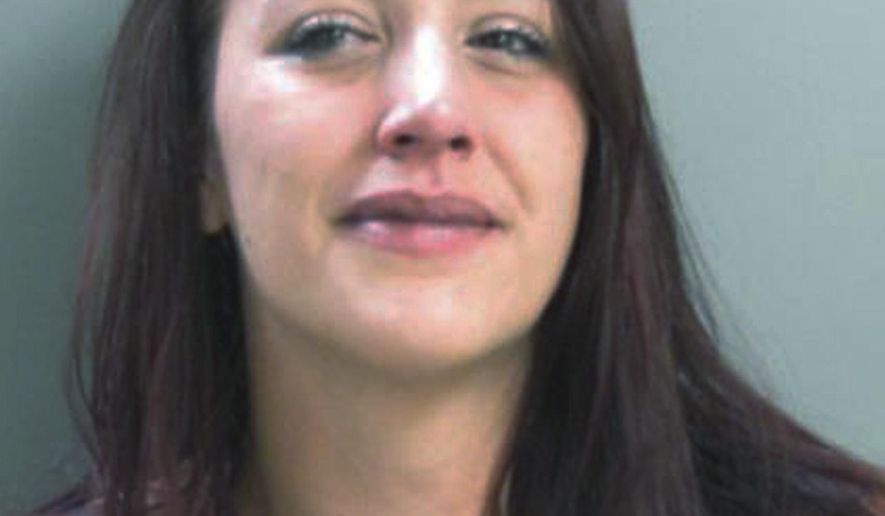 This booking photograph released Wednesday, July 12, 2017, by the Salem Police Department shows Emily Morin, of Concord, N.H., arrested twice Monday in Salem. Police said Morin was out on bail following a drug possession arrest, but returned to the police station hours later demanding the drug's return and was arrested on another charge. (Salem Police Department via AP)