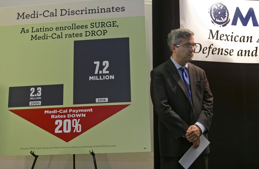 Thomas Saenz, president and general counsel with the Mexican American Legal Defense and Educational Fund, commonly known as MALDEF announces the filing of a Medi-Cal civil rights complaint in Los Angeles on Wednesday, July 12, 2017. The lawsuit alleges the state is violating Latinos' civil rights by providing low reimbursements to health care providers. The plaintiffs argue that California is denying proper health care to about a third of the state's residents by poorly funding the program that covers low-income families, some elderly patients, those with disabilities, foster children and pregnant women. The program also covers those whose incomes are near the federal poverty level. (AP Photo/Damian Dovarganes)