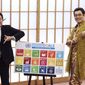Japanese comedian Pikotaro, right, and Japan&#39;s Foreign Minister Fumio Kishida pose to raise awareness about the United Nation&#39;s 17 Sustainable Development Goals (SDGs) at the ministry in Tokyo, Wednesday, July 12, 2017. Pikotaro, who has gained global fame with his &amp;quot;pen-pineapple-apple-pen&amp;quot; song, will debut at the United Nations with a new version of PPAP to promote sustainable development.(AP Photo/Eugene Hoshiko)