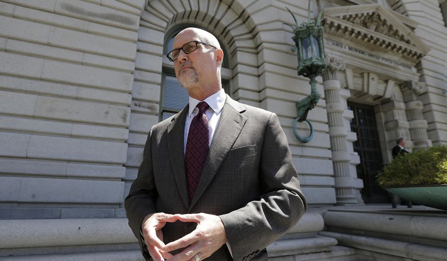 Jeffrey Kerr, general counsel to the People for the Ethical Treatment of Animals (PETA), speaks to reporters outside of the 9th U.S. Circuit Court of Appeals in San Francisco, Wednesday, July 12, 2017. Attorneys for David Slater, a wildlife photographer whose camera was used by a monkey to snap selfies, asked a federal appeals court to end a lawsuit seeking to give the animal rights to the photos. PETA sought a court order in 2015 allowing it to administer all proceeds from the photos to benefit the monkey. (AP Photo/Jeff Chiu)