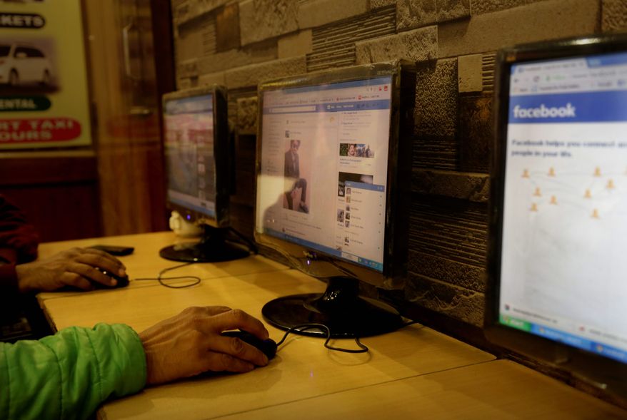 India’s telecoms regulator has essentially banned a Facebook program that sought to connect with low-income residents by offering free access to a limited version of the social network and other internet services, as part of a ruling in favor of net neutrality. (Associated Press/File)