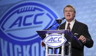 ACC Commissioner John Swofford speaks to the media during the Atlantic Coast Conference NCAA college football media day in Charlotte, N.C., Thursday, July 13, 2017. (AP Photo/Chuck Burton)