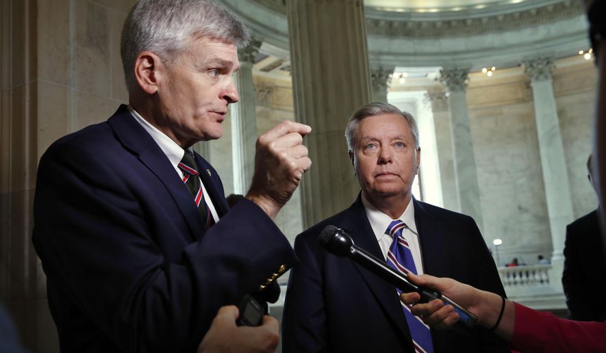 Sen. Bill Cassidy (left), who wrote the state block grant bill with Sen. Lindsey Graham, South Carolina Republican, said the legislation is near the vote threshold to pass. &quot;We are thinking that we can get this done by Sept. 30,&quot; he said Friday. (Associated Press/File)