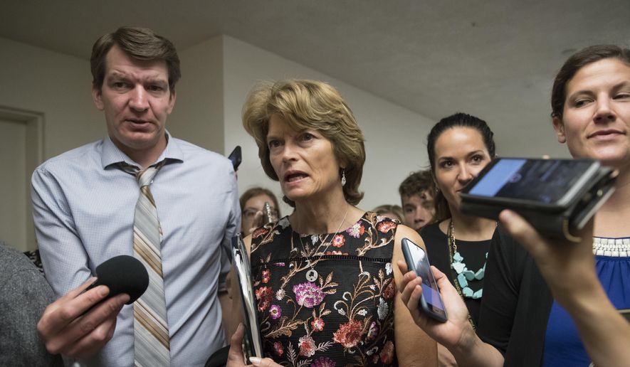Sen. Lisa Murkowski, R-Alaska, and other lawmakers, head to the Senate on Capitol Hill in Washington, Thursday, July 13, 2017, for a meeting on the revised Republican health care bill, which has been under attack from within the party, including by Murkowski. (AP Photo/J. Scott Applewhite) ** FILE **