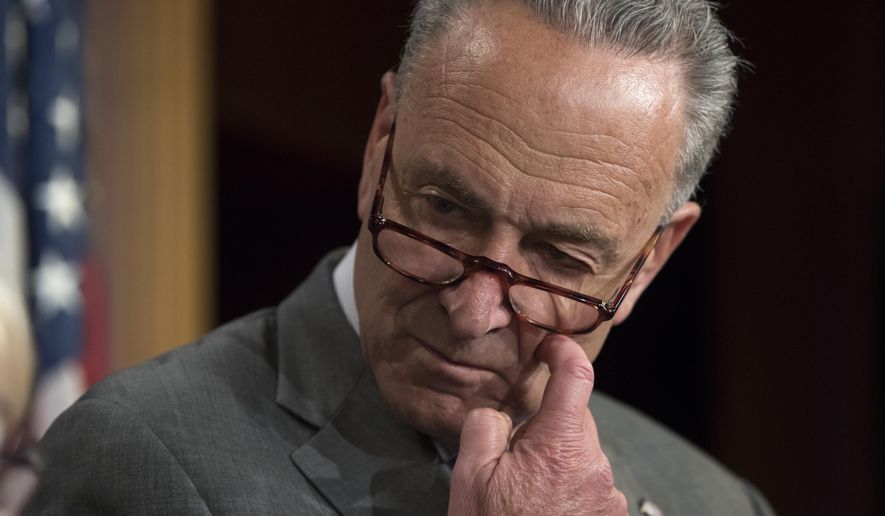 Senate Minority Leader Chuck Schumer of N.Y. pauses during a news conference on Capitol Hill in Washington, Thursday, July 13, 2017. Schumer warned that moves by House Republicans to make a down payment on the Mexico wall and cut domestic programs is a “dangerous, irresponsible path” that “can only lead to a government shutdown.”“They’re steering us towards a train wreck,” he said. (AP Photo/J. Scott Applewhite)