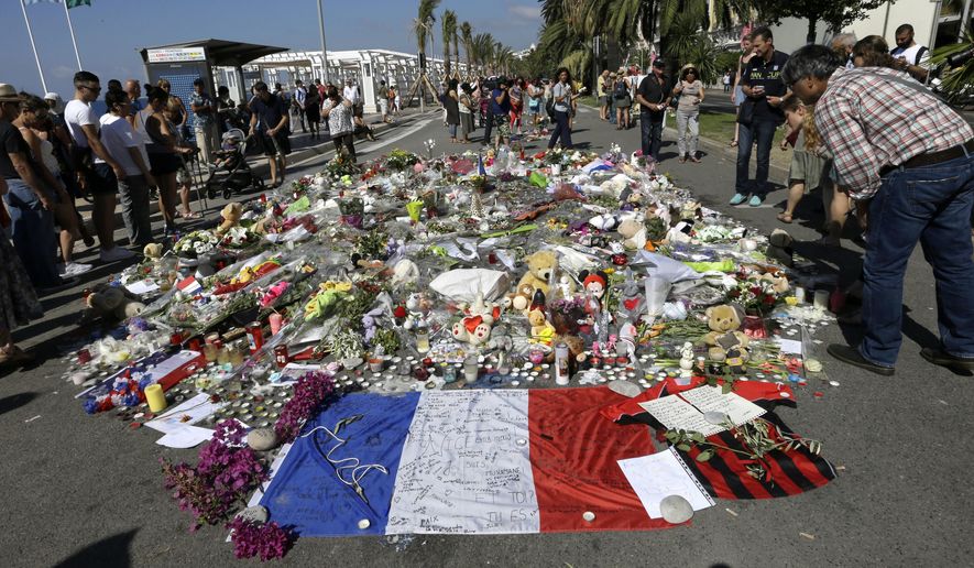 Flowers were placed on the Promenade des Anglais last year at the scene of the truck attack in Nice that killed 86 people celebrating France's Bastille Day. The massacre was a kind of watershed moment that was followed by a macabre wave of similar low-tech terrorist strikes in several Western European nations. (Associated Press/File)