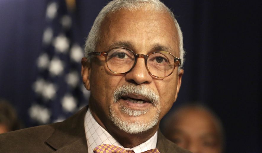 FILE - In this Dec. 14, 2015, file photo, Illinois State Sen. Donne Trotter speaks during a news conference held by the Illinois Legislative Black Caucus in Chicago. Illinois lawmakers who ended the nation's longest state fiscal standoff since the Great Depression have an ironic strategy for digging out of debt: taking on even more of it. Chicago Democratic Sen. Trotter says late-payment interest on $15 billion owed to vendors is far more expensive than interest on selling bonds. (AP Photo/M. Spencer Green, File)