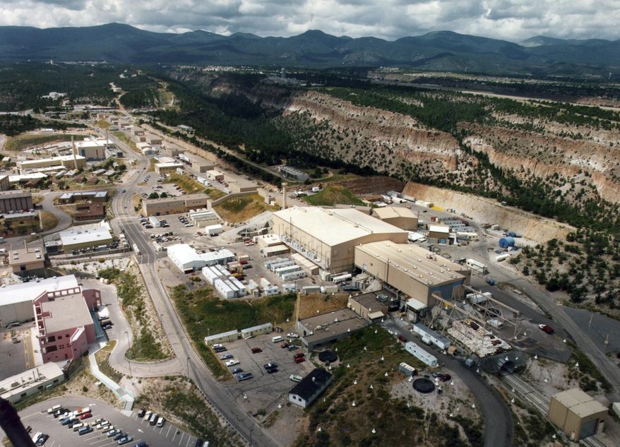 FILE - This undated file aerial photo shows the Los Alamos National laboratory in Los Alamos, N.M. Employees have been fired and other personnel actions have been taken at the laboratory after small amounts of radioactive material were mistakenly shipped aboard a commercial cargo plane. (The Albuquerque Journal via AP, File)
