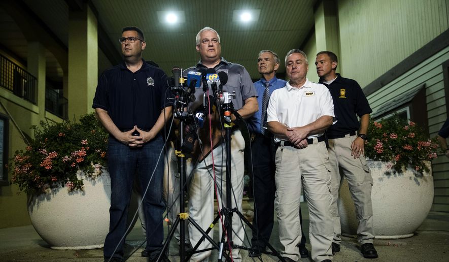 Matthew Weintraub, District Attorney for Bucks County, Pa., speaks with members of the media in New Hope, Pa., Thursday, July 13, 2017. Authorities said they've found human remains in their search for four missing young Pennsylvania men and they can now identify one victim. (AP Photo/Matt Rourke)