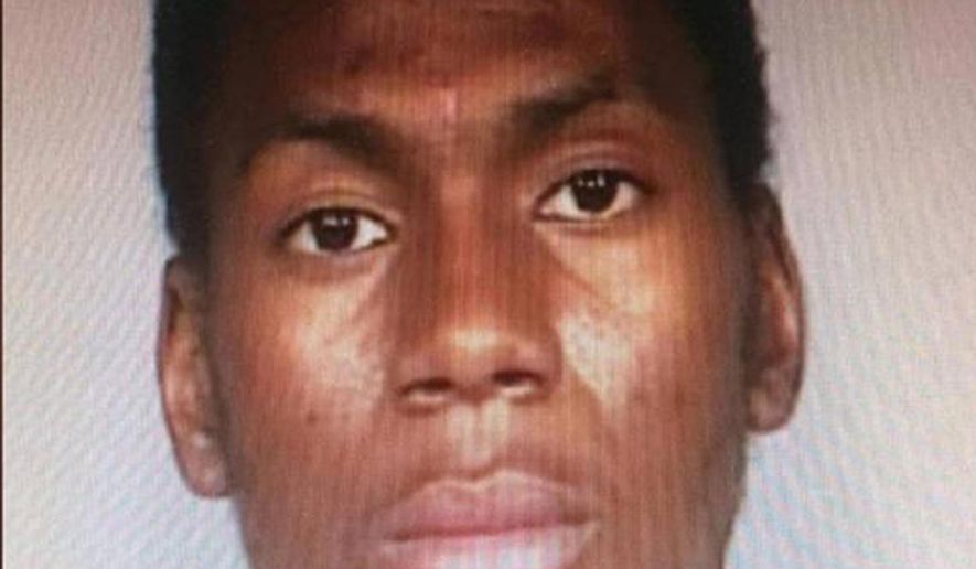 This undated photo provided by the Fresno Police Department shows murder suspect Ibn Lugman Haqq, 21, in Fresno, Calif. Central California police have captured Haqq who escaped from police headquarters after fighting with detectives and fleeing through a window. Details about where and when officers made the capture were not immediately available Thursday morning, July 13, 2017. (Fresno Police Department via AP)