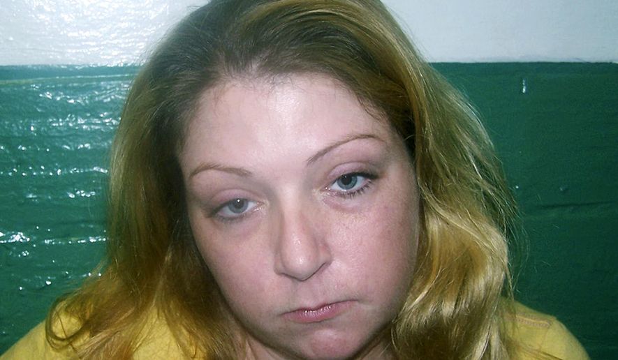 FILE - This undated file booking photo released by the Salisbury Police Department shows Leslie Aberle, arrested on a fugitive from justice charge in Salisbury, Mass. Aberle is tentatively scheduled to appear in federal court Thursday, July 13, 2017, to plead guilty in a proposed plea agreement to conspiracy to distribute and to possess with intent to distribute heroin and fentanyl in the case of Evangelique "Eve" Tarmey, who was found dead at a motel in Rochester, N.H., in October 2015. (Salisbury Police Department via AP, File)