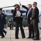 President Donald Trump and first lady Melania Trump board Air Force One, Wednesday, July 12, 2017, in Andrews Air Force Base, Md., en route to Paris.  (AP Photo/Carolyn Kaster)