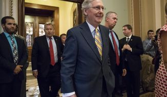 Senate Majority Leader Mitch McConnell of Ky. leaves the Senate chamber on Capitol Hill in Washington, Thursday, July 13, 2017, after announcing the revised version of the Republican health care bill. The bill has been in jeopardy because of opposition from within the GOP ranks. (AP Photo/J. Scott Applewhite)