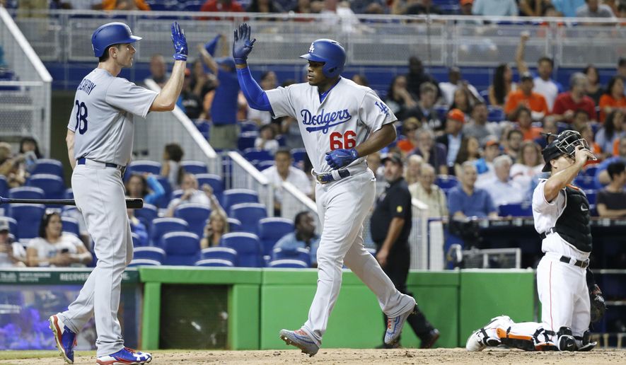 Puig confronts Marlins pitcher after nearly being hit