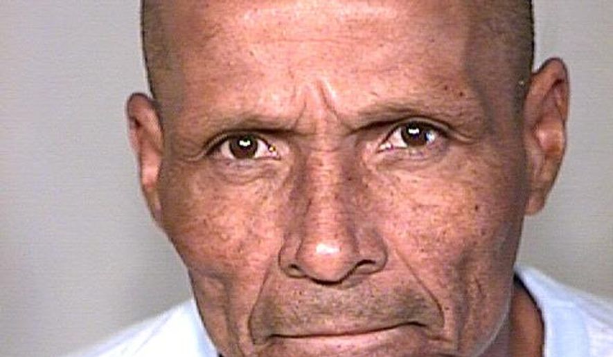 In this Thursday, July 13, 2017, photo released by the Pima County Sheriff's Department shows Louis Taylor, 63, from Tucson, Ariz. He remains jailed after being arrested Thursday on suspicion of armed robbery and kidnapping in the June holdup of a downtown-area hotel. Taylor who was released in 2013 after being imprisoned four decades in a deadly hotel fire in 1970 is now accused of armed robbery. (Pima County Sheriff's Department via AP)