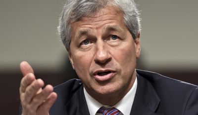 In this June 13, 2012, file photo, JPMorgan Chase CEO Jamie Dimon testifies before the Senate Banking Committee on Capitol Hill in Washington. During calls with reporters and Wall Street analysts on Friday, July 14, 2017, Dimon vented his irritation with politicians and the news media, arguing that the nation is spending too much time bickering instead of solving real issues. (AP Photo/J. Scott Applewhite, File)