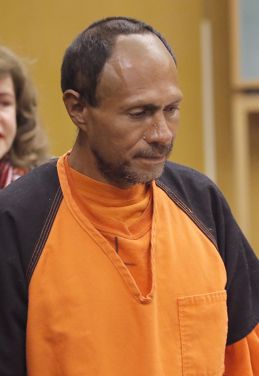 FILE - In this July 7, 2015 file photo, Juan Francisco Lopez-Sanchez walks into court for his arraignment at the Hall of Justice in San Francisco.  It’s been two years since Kate Steinle was randomly gunned down on a busy San Francisco pier in a shooting that set off a fierce national immigration debate. Lopez-Sanchez, the man accused of killing Steinle, is still waiting for his murder trial to be scheduled. He is set to appear in court Friday, July 14, 2017, when a trial date may get set.  (Michael Macor/San Francisco Chronicle via AP, Pool, File)