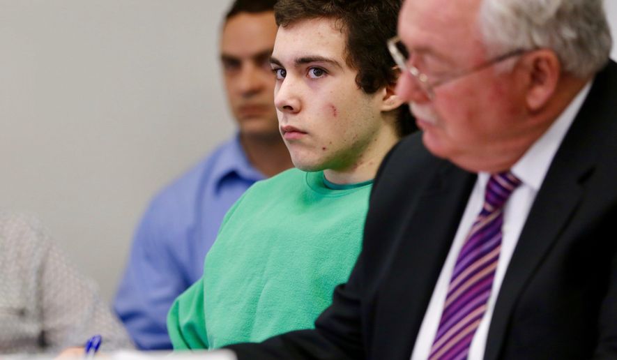 FILE- In this April 1, 2017, file photo, defendant Ely Serna sits with attorney Dennis Lieberman in Judge Lori Reisinger's courtroom in Champaign County Juvenile Court in Urbana, Ohio for a motion hearing to close Serna's upcoming competency hearing. Serna, a teen charged as an adult in an Ohio school shooting that wounded two students, has been moved from a detention center to a mental health hospital. (Jonathan Quilter/The Columbus Dispatch via AP, File)
