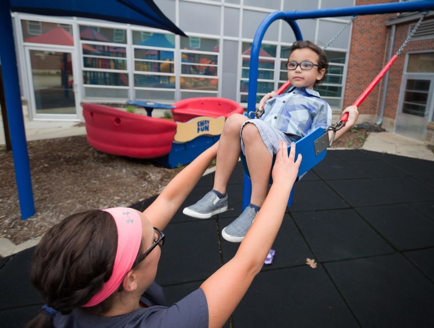 Researchers found that 19.8% of children in rural areas, compared to 17.4% of children in urban areas, were likely to be diagnosed with a developmental disability. (Kent Sievers/Omaha World-Herald via AP)