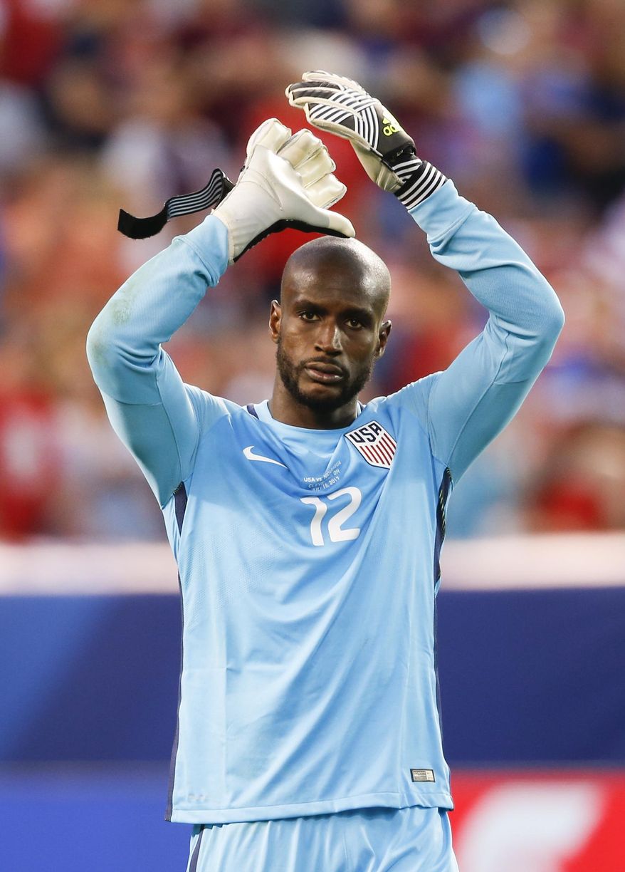 United States goalkeeper Bill Hamid (12) celebrates a victory over Nicaragua in a CONCACAF Gold Cup soccer match in Cleveland, Ohio, Saturday, July 15, 2017. (AP Photo/Ron Schwane)
