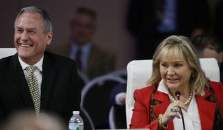 Oklahoma Republican Gov. Mary Fallin and South Dakota Republican Gov. Dennis Daugaard, left, laugh as Fallin addresses a plenary session entitled &amp;quot;The Workforce of Tomorrow&amp;quot; on the third day of the National Governors Association&#x27;s meeting Saturday, July 15, 2017, in Providence, R.I. (AP Photo/Stephan Savoia)