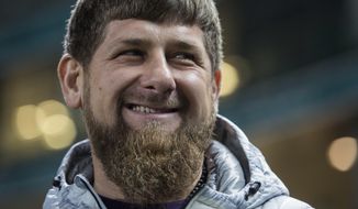 FILE - In this file photo dated Tuesday, Nov. 15, 2016, Chechen regional leader Ramzan Kadyrov smiles before an international friendly soccer match between Russia and Romania in Grozny, Russia. Chechnya&#39;s strongman leader in a new interview, released on Friday, July 14, 2017, has harshly denounced claims that the Russian republic has tortured and killed gay men, denying that there are even any homosexual men in his region. (AP Photo/Denis Tyrin, File)