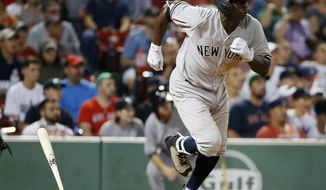 New York Yankees&#39; Didi Gregorius runs on his RBI single during the 16th inning of the team&#39;s baseball game against the Boston Red Sox in Boston, Saturday, July 15, 2017. (AP Photo/Michael Dwyer)