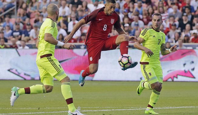 FILE - In this Saturday, June 3, 2017, file photo, United States forward Clint Dempsey (8) controls the ball as Venezuela&#x27;s Jose Manuel Velazquez, left, and Pablo Camacho (17) defend in the first half during an international friendly match  in Sandy, Utah. On Sunday, July 16, 2017, the U.S. Soccer Federation announced that Dempsey, midfielder Michael Bradley and goalkeeper Tim Howard are among six additions to the U.S. roster for the knockout phase of the CONCACAF Gold Cup. U.S. coach Bruce Arena also added forward Jozy Altidore, midfielder Darlington Nagbe and goalkeeper Jesse Gonzalez. (AP Photo/Rick Bowmer, File)
