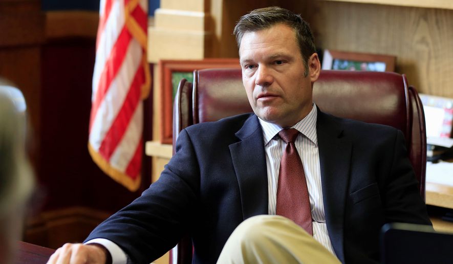 A privacy group is suing Kansas Secretary of State Kris W. Kobach and President Trump&#x27;s commission on election fraud after Mr. Kobach requested states turn over names and other public information on voters. (Associated Press) ** FILE **