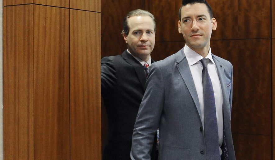 In this April 29, 2016, file photo, David Robert Daleiden, right, with attorney Jared Woodfill leave a courtroom after a hearing in Houston. A federal judge found the anti-abortion activist, known for clandestine videos of abortion-rights advocates, in contempt on Monday, July 17, 2017, after additional secretly-taken recordings appeared online. In a separate legal matter, the 9th U.S. Circuit Court of Appeals on May 16, 2018 dealt a blow to Mr. Daleiden by refusing to toss out a Planned Parenthood lawsuit against the activist&#39;s organization, the Center for Medical Progress. (AP Photo/Pat Sullivan, File) **FILE**
