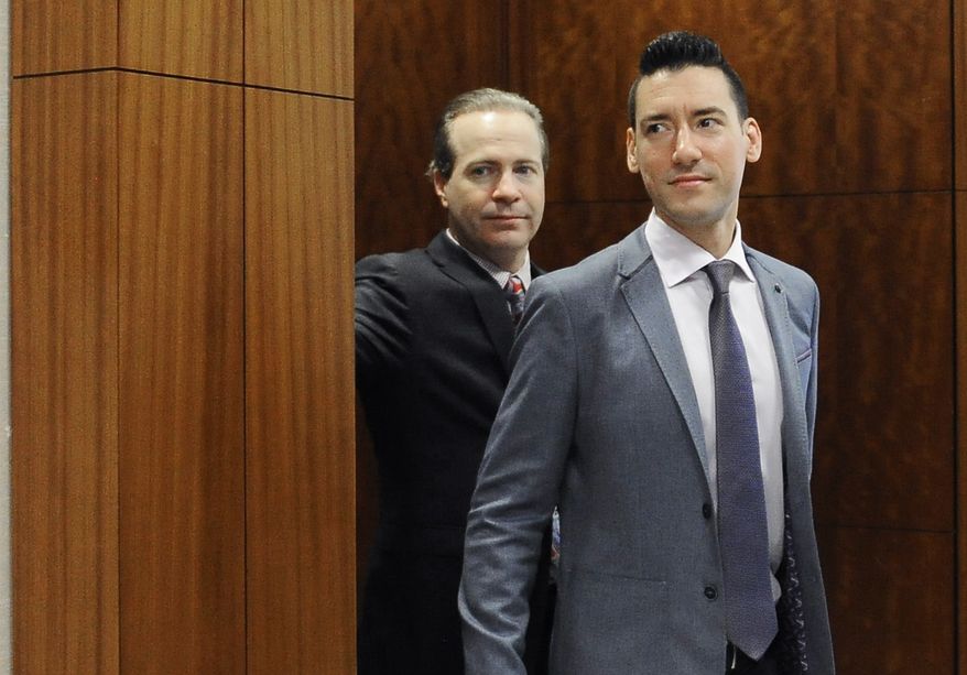 In this April 29, 2016, file photo, David Robert Daleiden, right, with attorney Jared Woodfill leave a courtroom after a hearing in Houston. A federal judge found the anti-abortion activist, known for clandestine videos of abortion-rights advocates, in contempt on Monday, July 17, 2017, after additional secretly-taken recordings appeared online. In a separate legal matter, the 9th U.S. Circuit Court of Appeals on May 16, 2018 dealt a blow to Mr. Daleiden by refusing to toss out a Planned Parenthood lawsuit against the activist&#39;s organization, the Center for Medical Progress. (AP Photo/Pat Sullivan, File) **FILE**