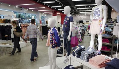 This Friday, July 14, 2017, photo shows Cat &amp; Jack jeans and tops, made with Repreve polyester fabric created from recycled plastic bottles, on display at a Target store in New York. A growing number of major retailers such as fast-fashion chain H&amp;M, Target Corp. and J.C. Penney are coming out with fashions that use waste from all types of trash, including plastic bottles. But price still rules for shoppers. (AP Photo/Mark Lennihan) ** FILE **