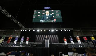 Big 12 commissioner Bob Bowlsby speaks to reporters during the Big 12 NCAA college football media day at the Dallas Cowboys practice facilities in Frisco, Texas, Monday, July 17, 2017. (AP Photo/LM Otero)