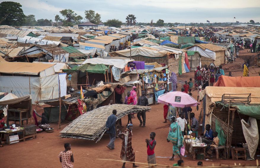 FILE - This May 14, 2017 file photo, shows the United Nations' protected camp in Wau, South Sudan, which since clashes in April is now the most congested internally displaced camp in the country, with almost 40,000 inhabitants. Eight of the largest U.S.-based aid groups are joining together in a new campaign to address what the United Nations calls the world's largest humanitarian crisis in more than 70 years. Eight of the largest U.S.-based aid groups are joining together in a new campaign to address what the United Nations calls the world's largest humanitarian crisis in more than 70 years. More than 20 million people are at risk of famine in nine African nations and Yemen. (AP Photo, File)