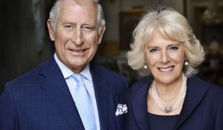 CORRECTS NAME  This photo taken in May 2017 shows Britain&#39;s Prince Charles and his wife Camilla, Duchess of Cornwall in Clarence House, London. The photograph has been released by Clarence House to mark the Duchess of Cornwall&#39;s 70th birthday. (Mario Testino via Clarence House via AP)