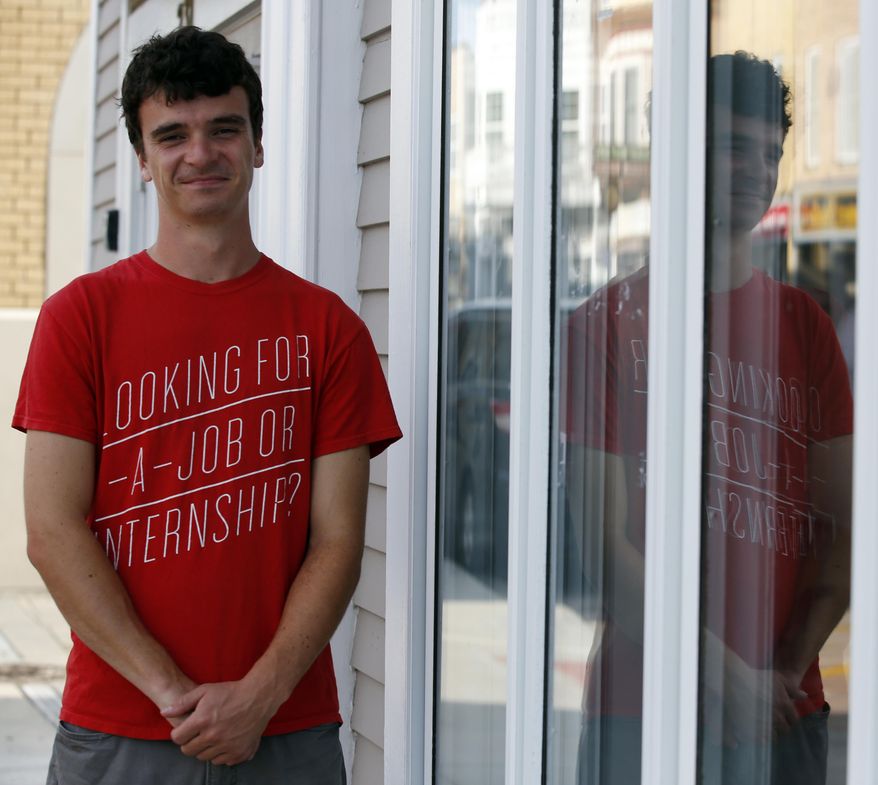 In this July 12, 2017, photo, Julian Senn-Raemont poses for a portrait in downtown Woodstock, Ill. The 24-year-old writer-musician hasn't known a world without a health care safety net and hates being forced by law to get coverage. Insurers need young, healthy enrollees like him to keep premiums down for everyone something Republicans building a replacement for the Affordable Care Act have addressed with gap-in-coverage penalties and lower prices for some young adults. (AP Photo/Nam Y. Huh)